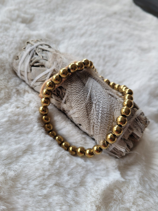 Armbandje Hematiet "Gold" 6 mm