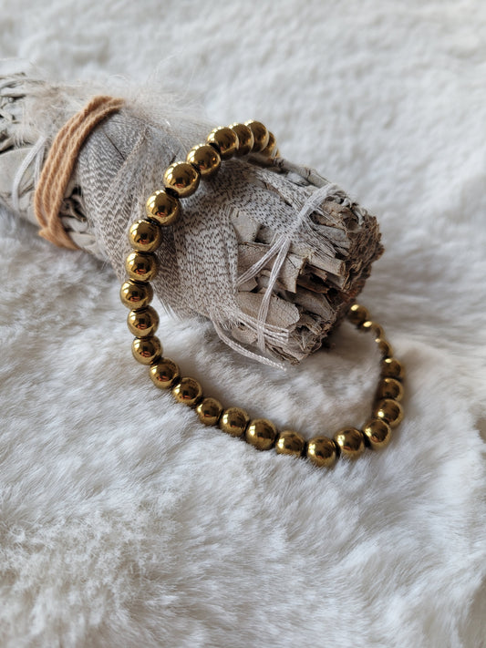 Armbandje Hematiet "Gold" 6 mm