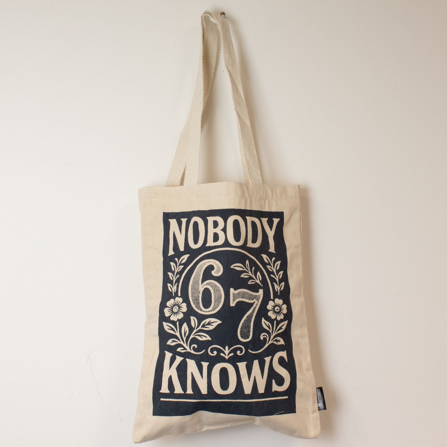 Nomad Sari Iconic Toni Tote Bag – Nobody Knows 67 – Naturel 10oz